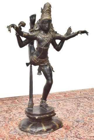 Appraisal: Large patinated bronze standing Hindu figure having four protruding arms