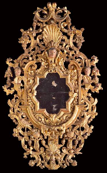 Appraisal: A good Spanish Colonial Baroque polychrome and giltwood mirror th