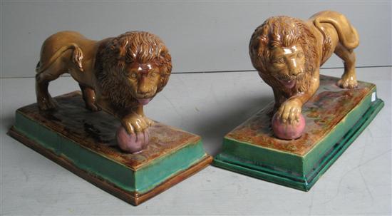 Appraisal: Pair of th century Majolica glazed lions in Minton style