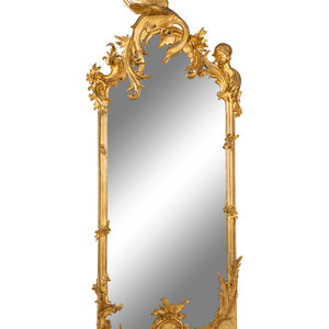 Appraisal: A French Rococo-Style Carved Giltwood Mirror Early th Century Decorated