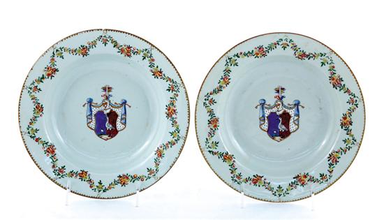 Appraisal: Pair Chinese Export armorial soup plates circa floral garland wide