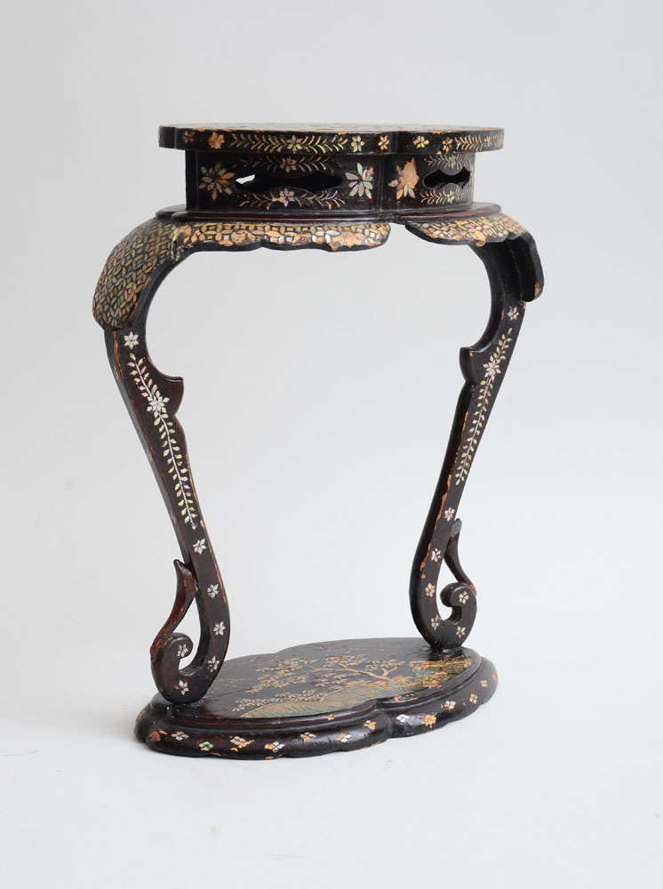 Appraisal: JAPANESE BLACK LACQUER AND MOTHER-OF-PEARL STAND With an oval pierced