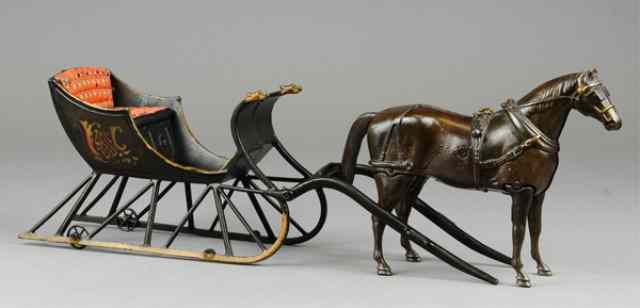 Appraisal: IVES CUTTER SLEIGH WITH WALKING HORSE Cataloged in the 's