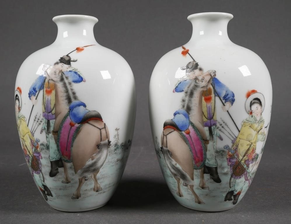 Appraisal: Pair of Chinese ceramic vases featuring a female archer and