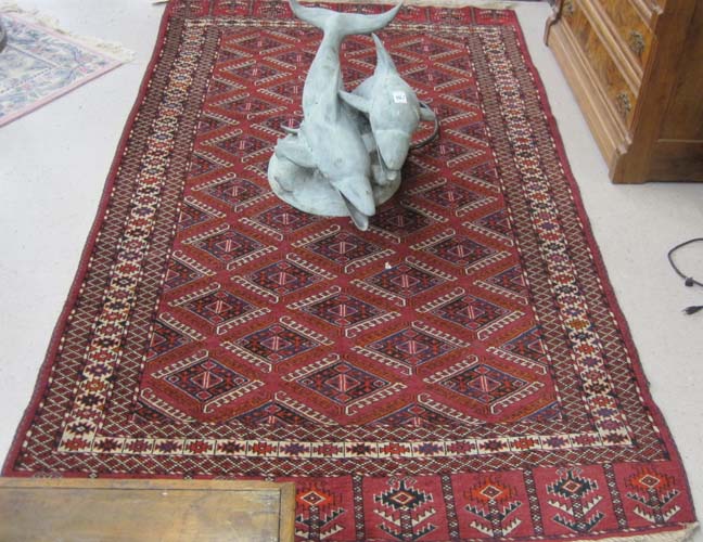 Appraisal: PERSIAN TURKOMAN CARPET hand knotted in an overall diamond-shaped gol