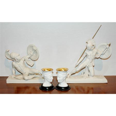 Appraisal: Two Spanish Bisque Porcelain Figures of Roman Warriors Together with