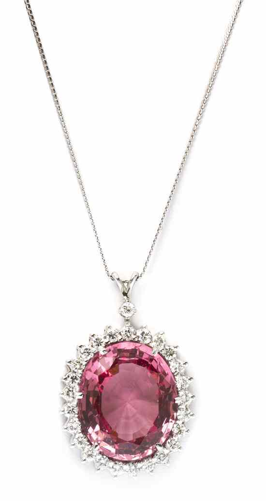 Appraisal: A White Gold Spinel and Diamond Pendant containing one oval