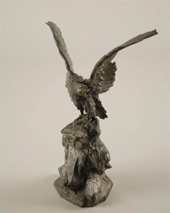 Appraisal: A th C Cast Spelter Eagle wings spread standing on