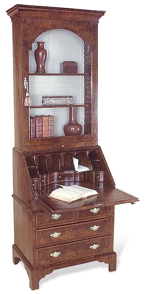 Appraisal: A Queen Anne style walnut bureau bookcase Enclosed by a