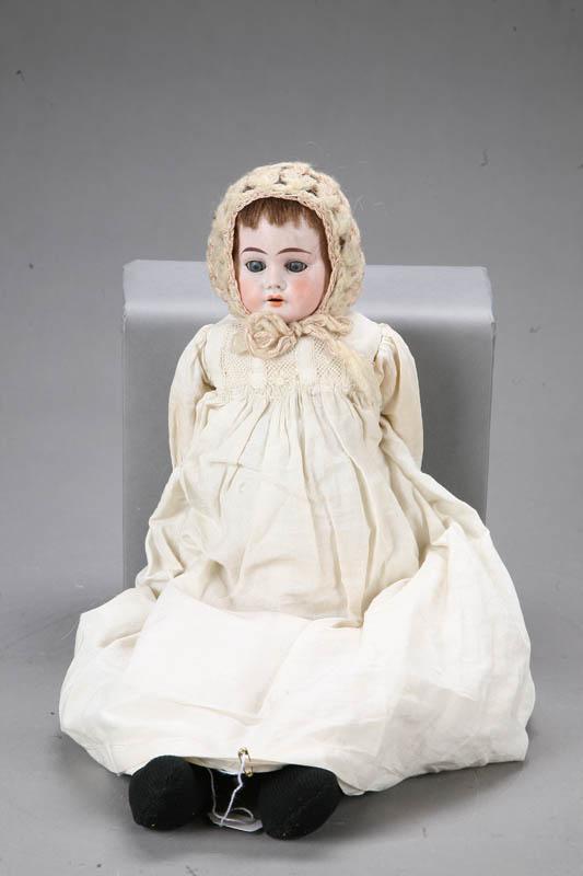 Appraisal: BISQUE HEAD DOLL Kid body bisque head and arms Marked