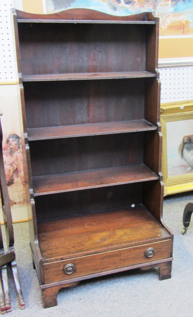 Appraisal: A Regency style mahogany five tier waterfall bookcase with single