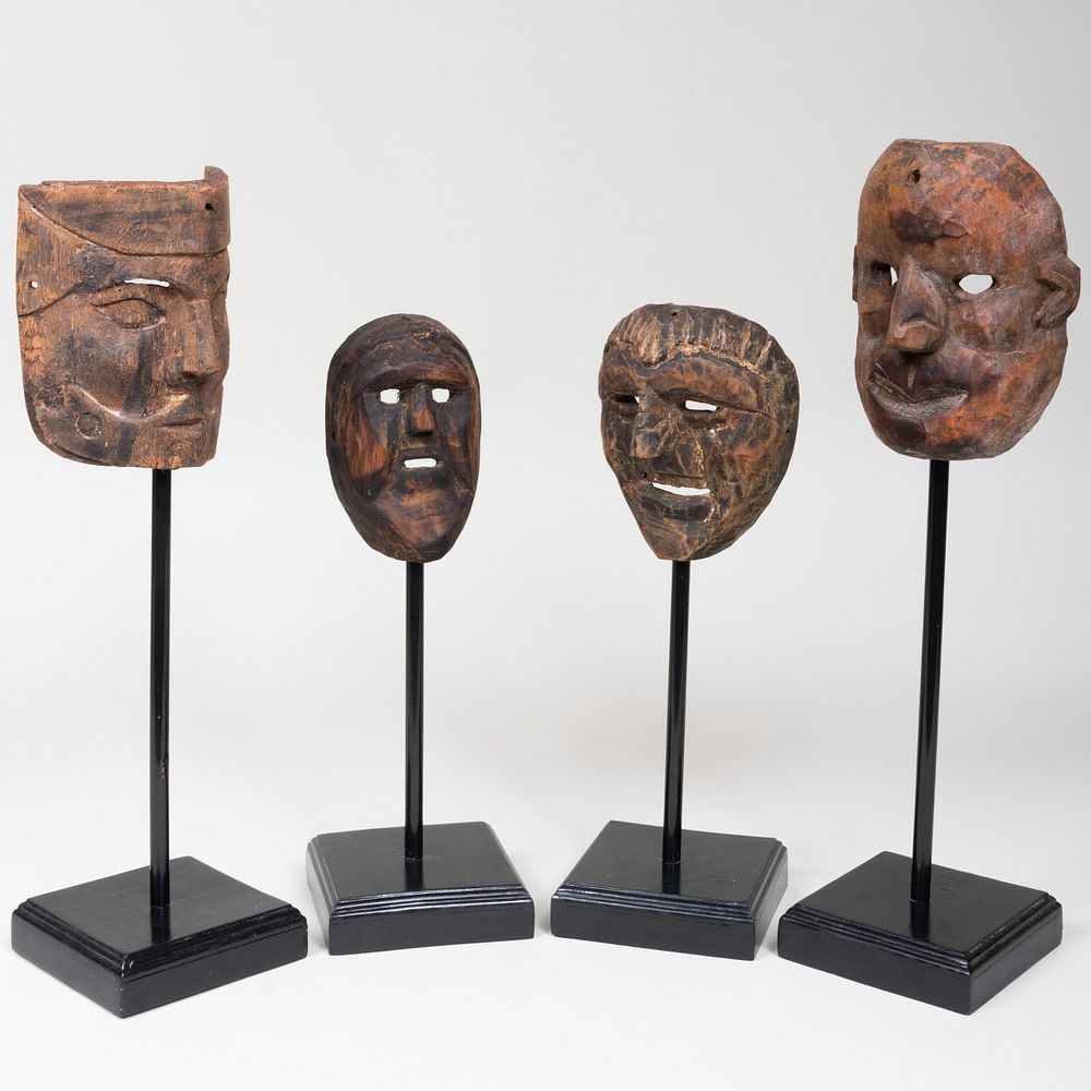 Appraisal: Group of Four Ethnographic Carved Wood Masks Possibly Tibetan Raised