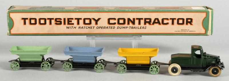 Appraisal: Diecast Tootsietoy Contractor Truck Cart Set Description Includes four pieces