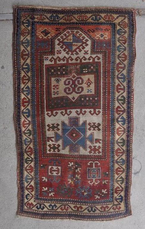 Appraisal: Kazak Prayer Rug with pile wear loss soiling stains end