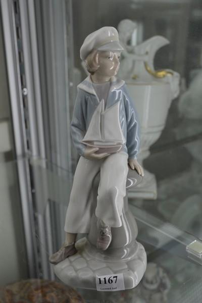 Appraisal: LLADRO PORCELAIN FIGURE BOY WITH BOAT