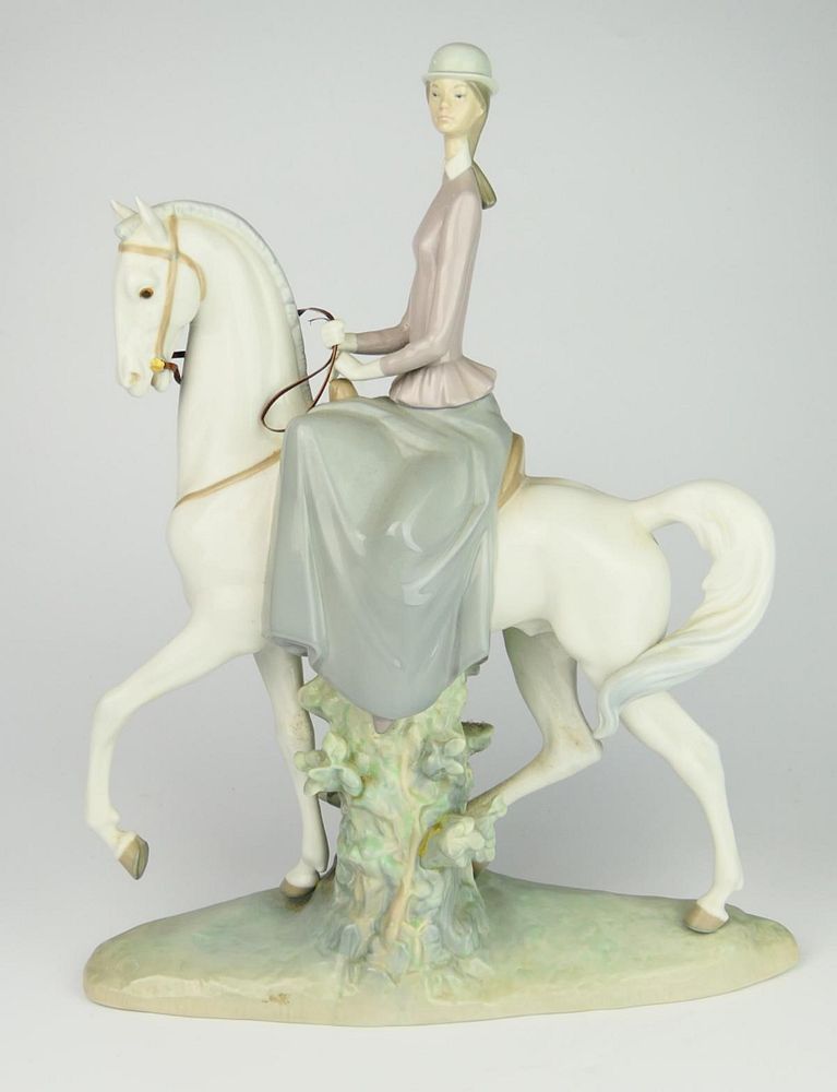 Appraisal: LLADRO PORCELAIN FEMALE EQUESTRIAN FIGURE Lladro Spanish glazed porcelain large