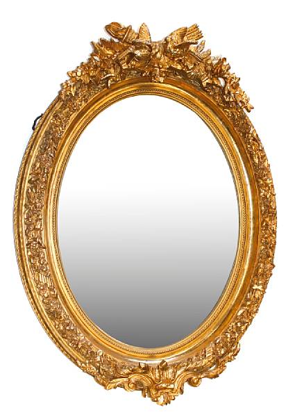 Appraisal: A Louis XVI style oval giltwood mirror height in width