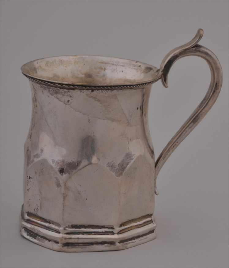 Appraisal: AMERICAN COIN SILVER SHAPED MUG WITH ARCADED OCTAGONAL BASE AND