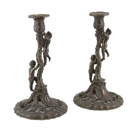 Appraisal: Companion Pair of Rococo Style Bronze Candlesticks Estimate -