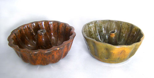 Appraisal: Two redware food molds th c h dia and h