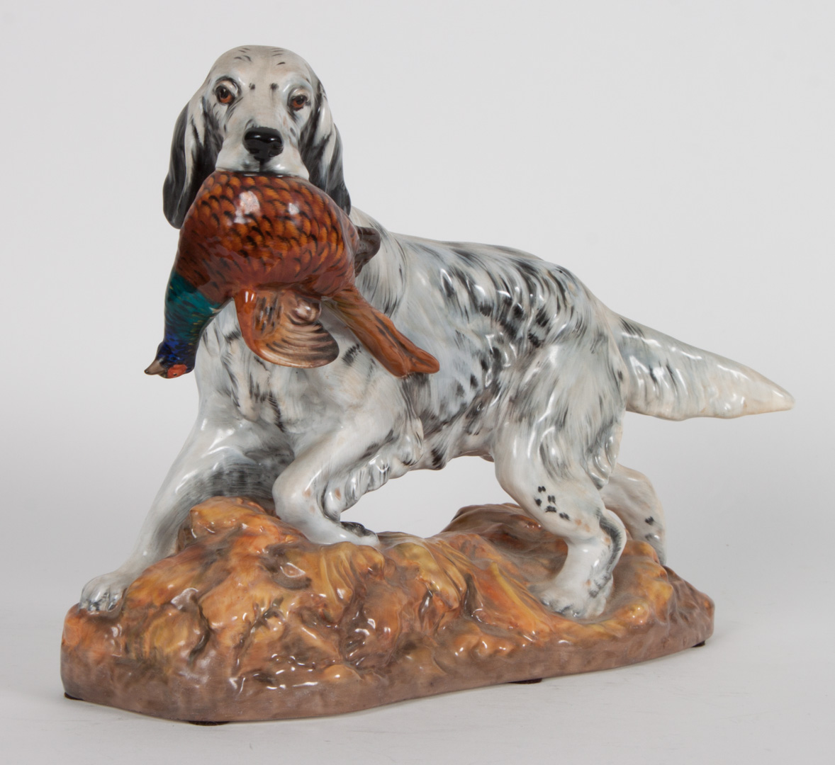 Appraisal: Royal Doulton china English Setter modeled as dog with pheasant