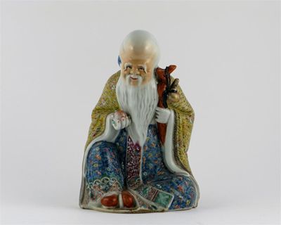 Appraisal: A Chinese famille rose seated figure of Shou Lao clasping