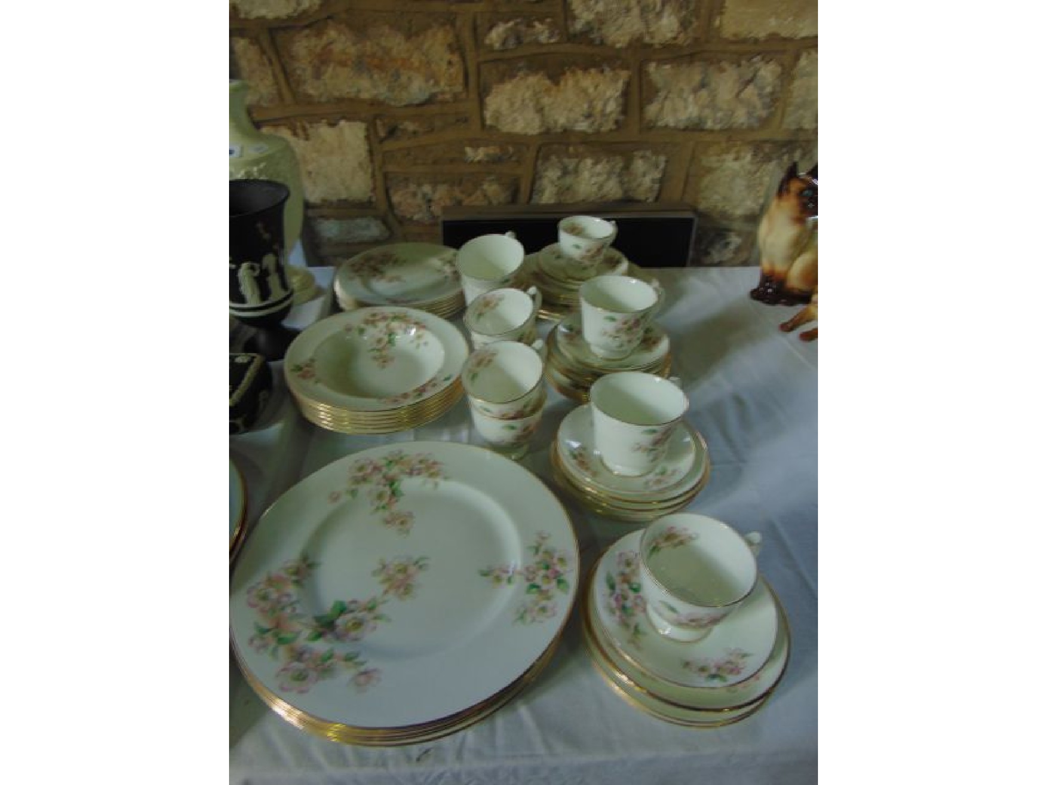 Appraisal: A quantity of Coalport dinner and teawares with apple blossom