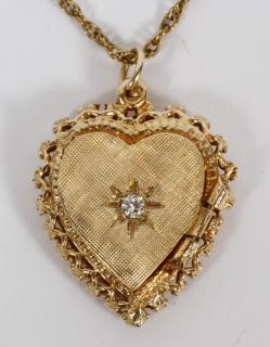 Appraisal: KT GOLD HEART LOCKET KT GOLD HEART LOCKET Hinged locket