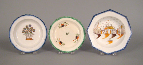 Appraisal: Three leeds feather edge plates th c with chinoiserie basket