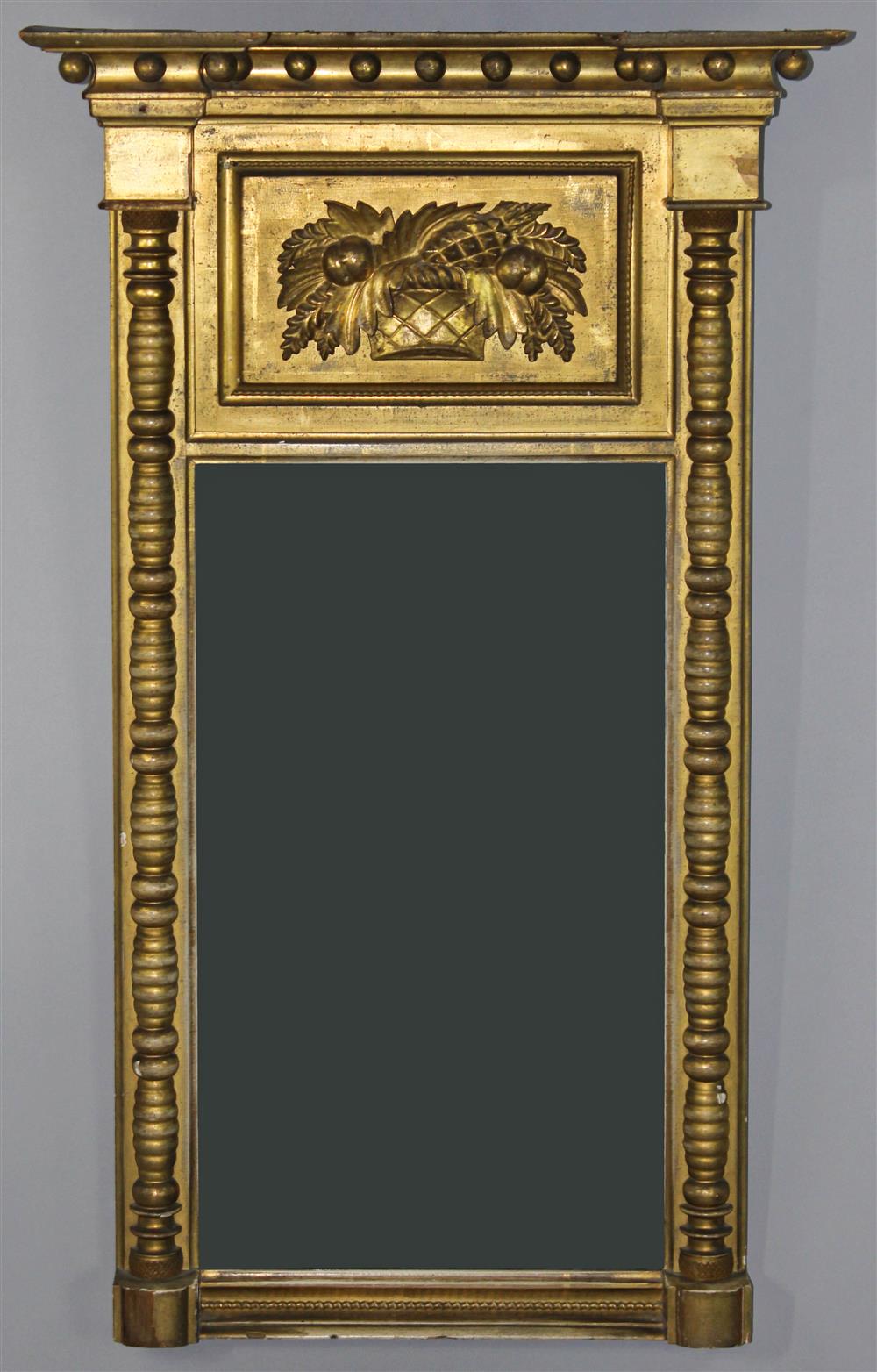 Appraisal: CLASSICAL CARVED GILTWOOD PIER MIRROR having a molded cornice with