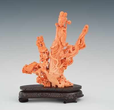 Appraisal: An Exceptional Carved Coral Quan Yin th Century Standing figure