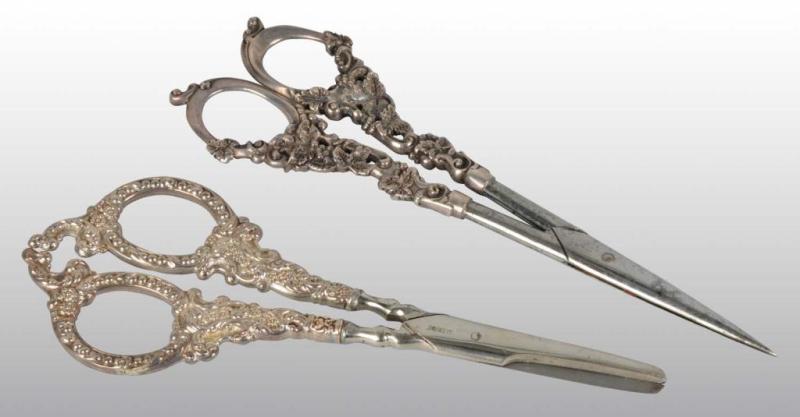 Appraisal: Lot of Pairs of Silver Handled Scissors Description Each pair