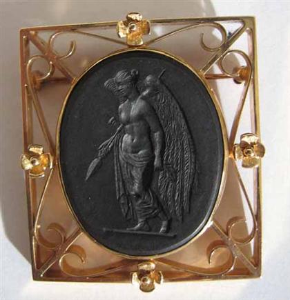 Appraisal: A Wedgwood black basalt pin PROVENANCE The Property of a