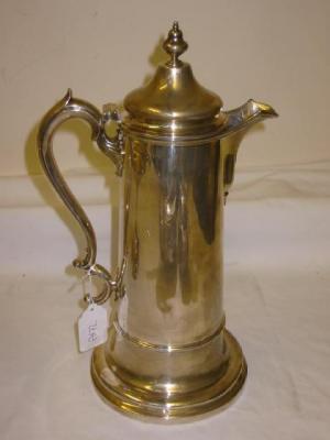 Appraisal: A VICTORIAN WINE FLAGON of tapering form the domed lid