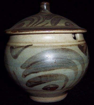 Appraisal: A Bernard Leach pottery jar and cover painted with leaf