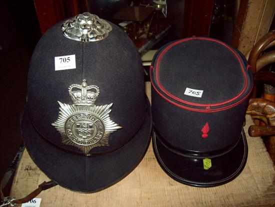 Appraisal: AN ANTIQUE BOBBIES HAT AND A FRENCH POLICEMAN'S HAT