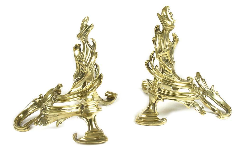 Appraisal: A pair of French gilt brass rococo style chenets