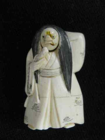 Appraisal: Carved Ivory Netsuke of a Samari Warrior revolving ''happy'' ''angry''