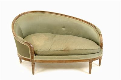 Appraisal: A French walnut settee the moulded and carved frame upholstered