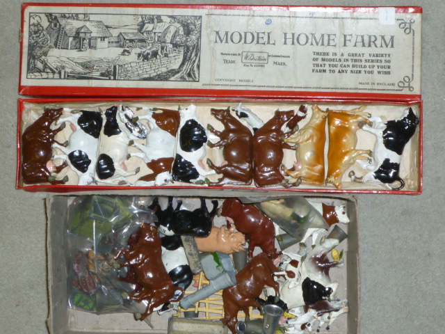 Appraisal: A quantity of Britains metal cows other farm animals figures