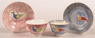 Appraisal: Two Peafowl Spatterware Cups and Saucers Two Peafowl Pattern Spatterware