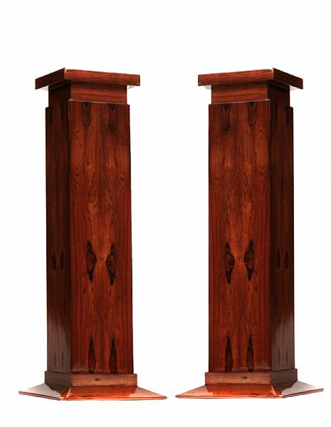 Appraisal: A pair of Art Deco style walnut veneer pedestals height