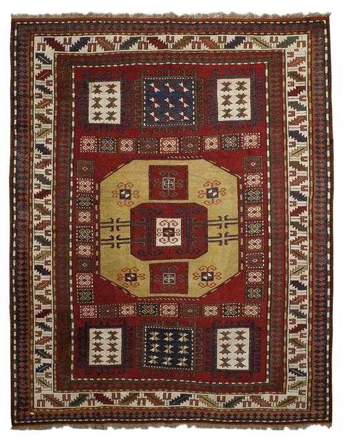 Appraisal: KARATCHOPH antique Red central field geometrically patterned with seven medallions