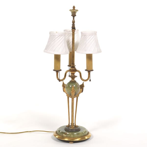 Appraisal: GILT BRASS AND ONYX LAMP On three feet with round