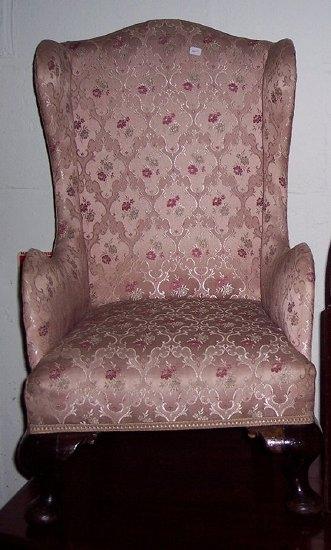 Appraisal: A child's th Century style wing armchair the upholstered back