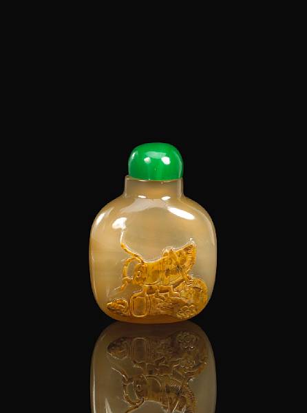 Appraisal: An agate bottle th Century Of well hollowed compressed ovoid