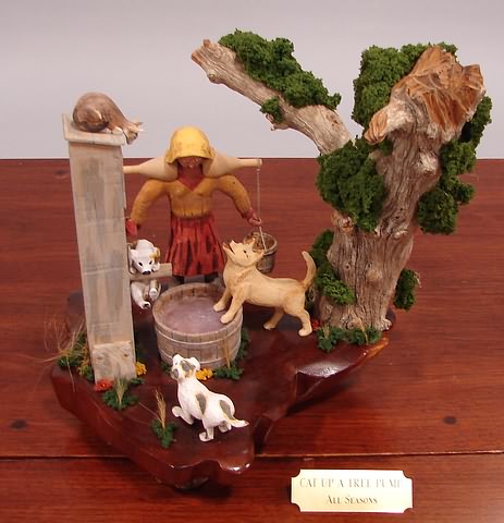 Appraisal: John Dale carving Cat Up a Tree Pump Artist American