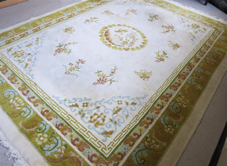 Appraisal: HAND KNOTTED ORIENTAL CARPET Indo-Chinese tranditional Peking design on cream