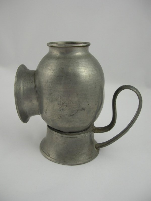 Appraisal: Chinese pewter mosquito catcher two part round base with fuel