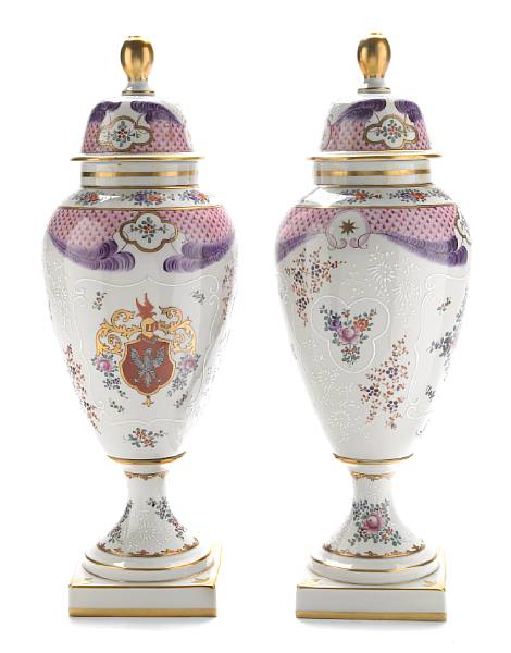 Appraisal: A pair of Paris porcelain covered urns restorations and repairs